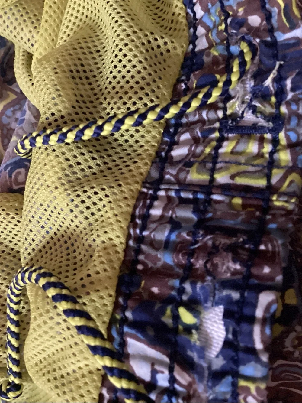 vintage 1990s Nike geometric abstract print swim trunks